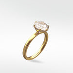 Angled view of the yellow gold Lily Engagement Ring with an oval-cut diamond solitaire set in unique petal claws.