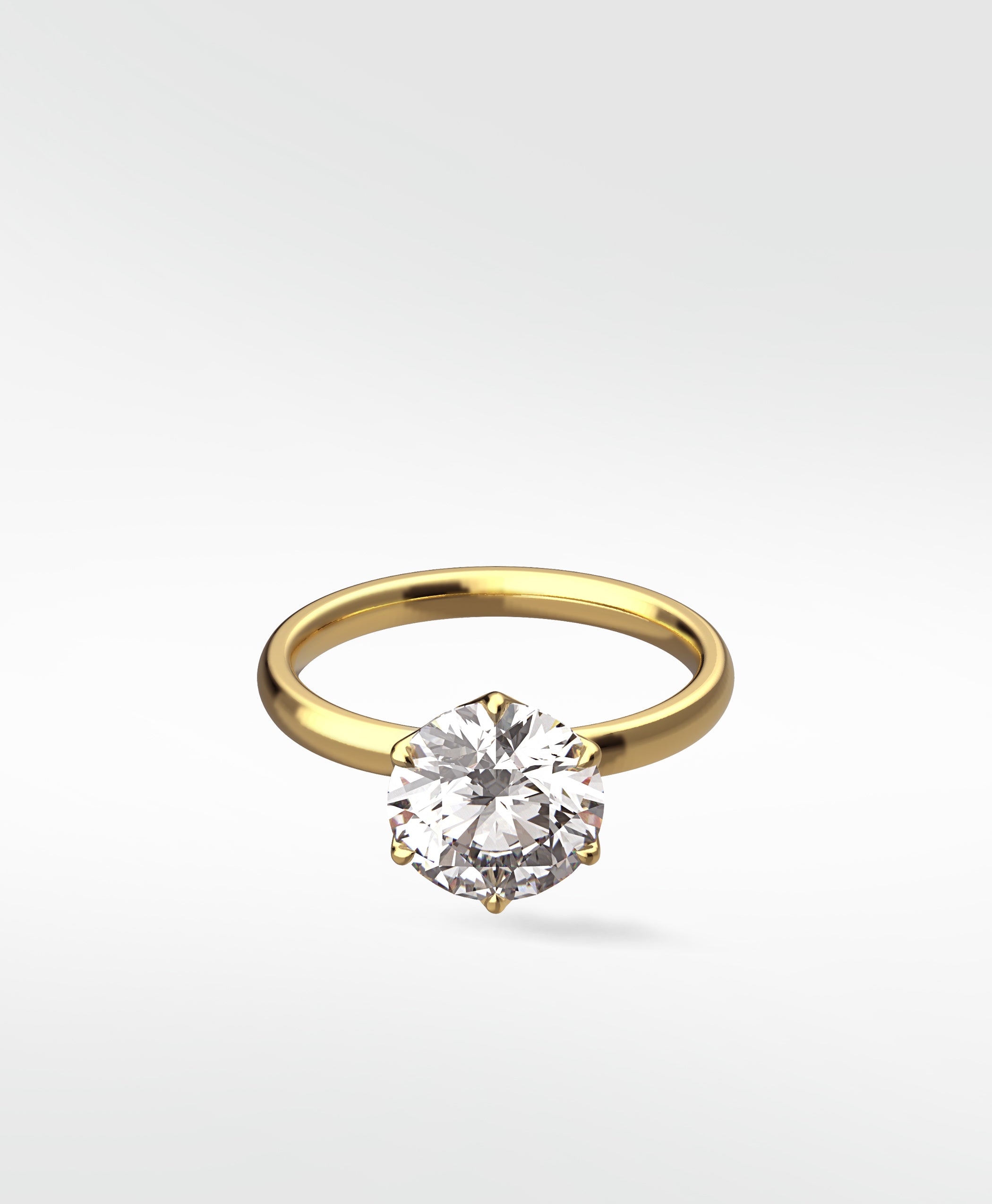 Lily Engagement Ring in yellow gold with a round brilliant diamond in a six-prong petal claw setting.