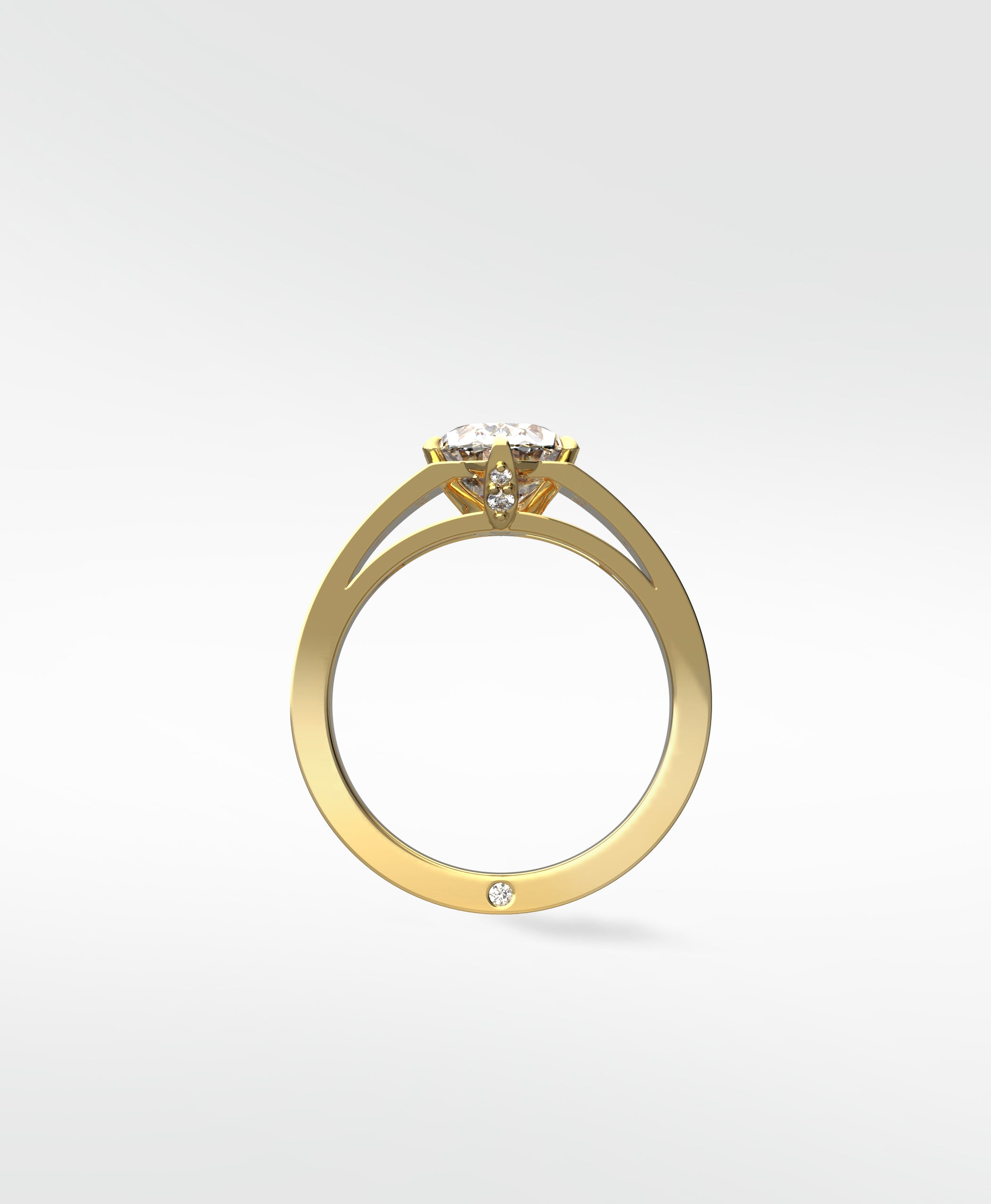 Profile view of the Papaya Engagement Ring in yellow gold, showing a split shank, accent diamonds, and a surprise diamond inside.