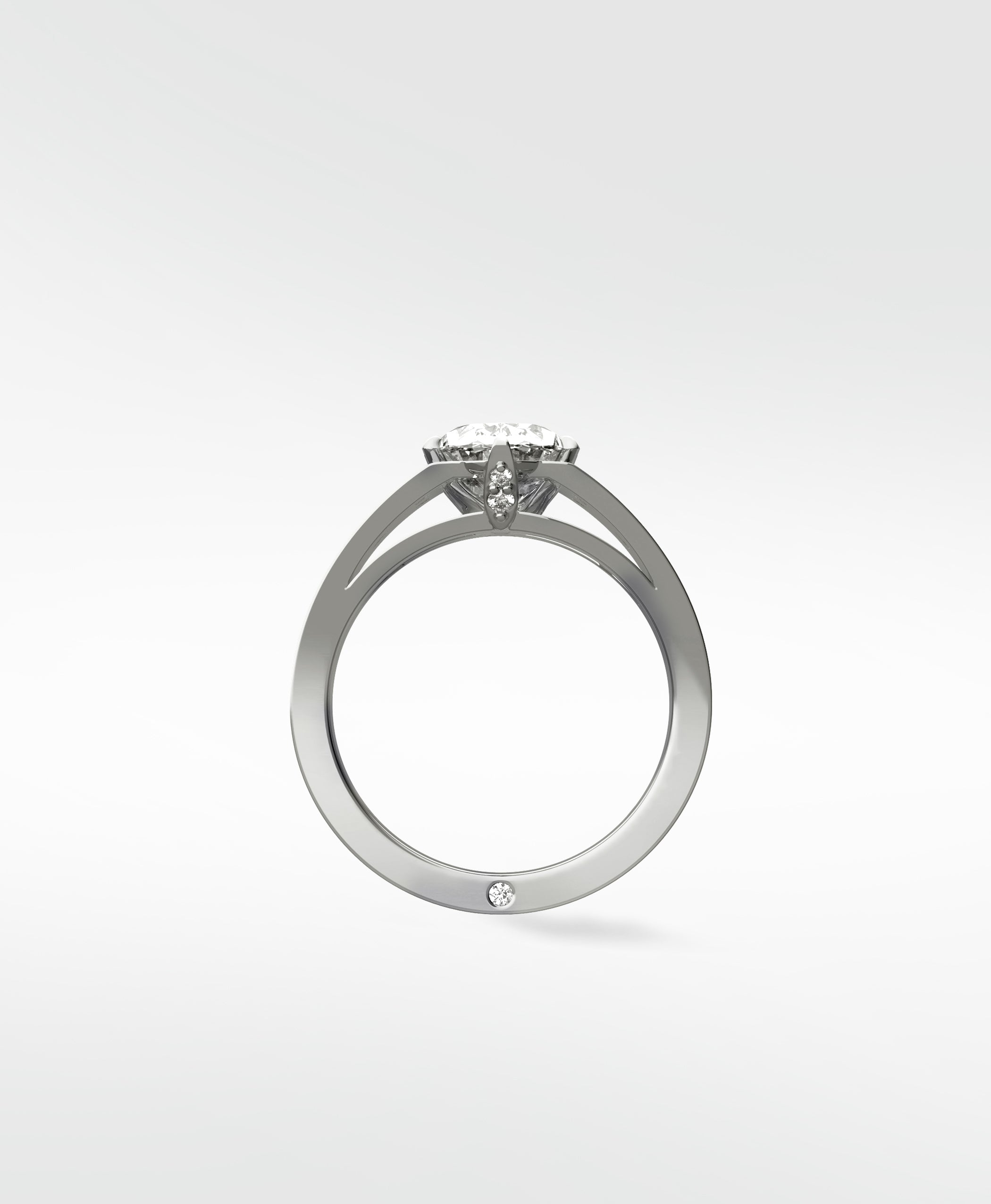 Profile view of the Lark & Berry Papaya Engagement Ring in white gold, showing the split shank and side accent diamonds.