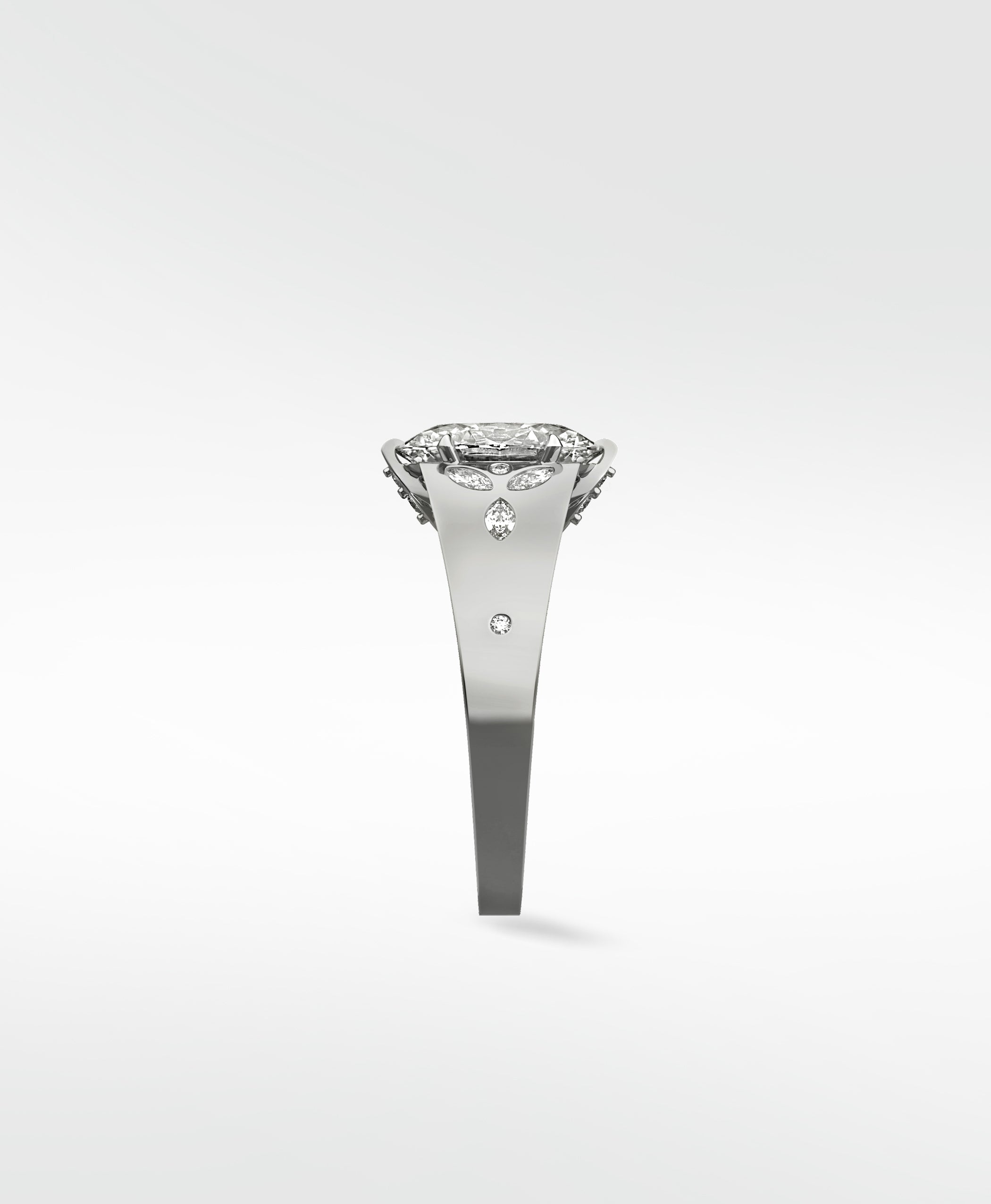 Side profile of the Papaya Engagement Ring in platinum with intricate marquise and round diamond accents on the detailed setting.