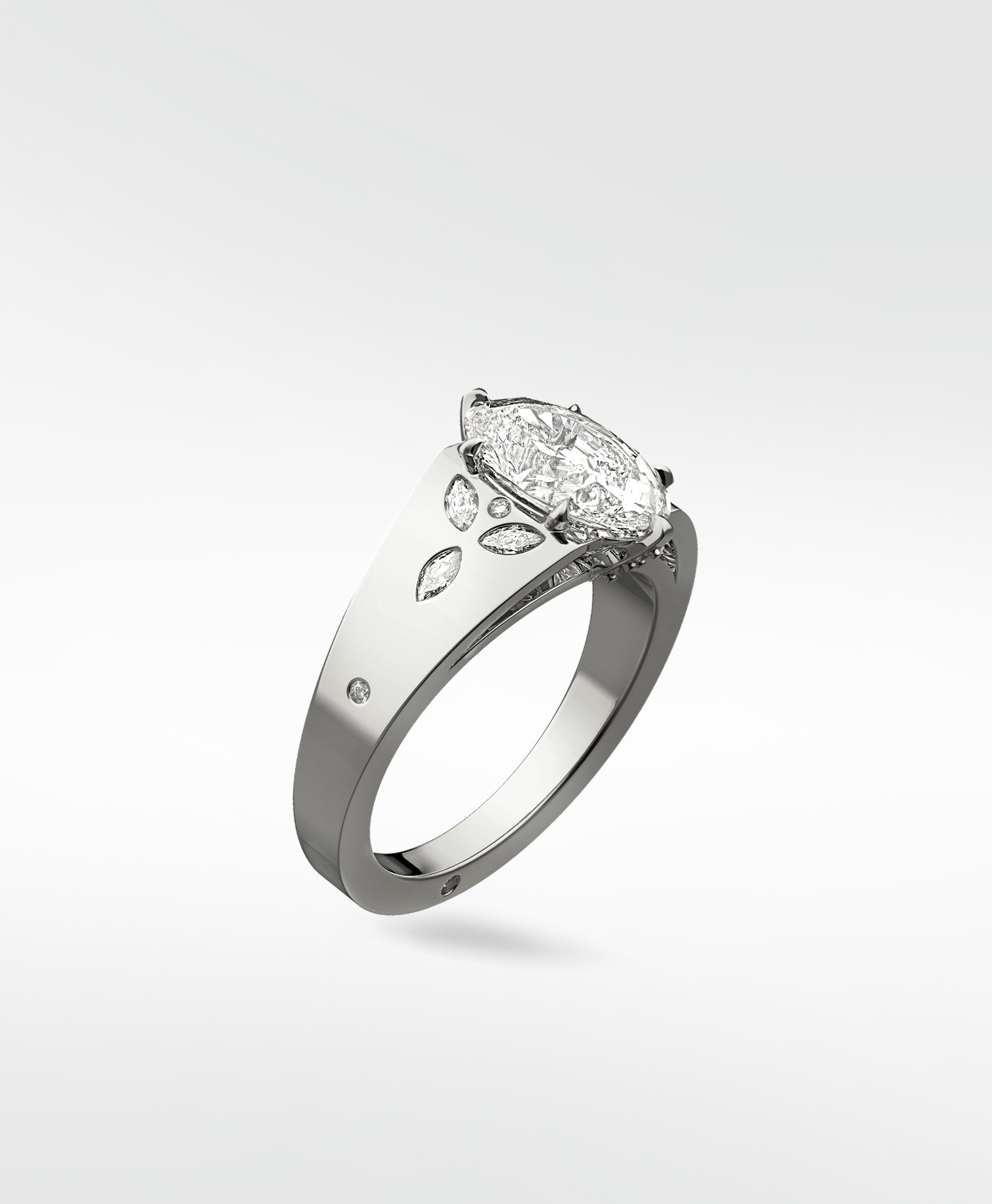 The Papaya Engagement Ring in platinum, featuring a large marquise-cut diamond and floral diamond accents on the band.