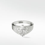 The Papaya Engagement Ring in platinum, featuring an oval-cut diamond with leaf-like marquise and round diamond accents.