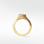 Side profile of the Mondo Engagement Ring in yellow gold, showing its vintage filigree gallery and diamond setting.