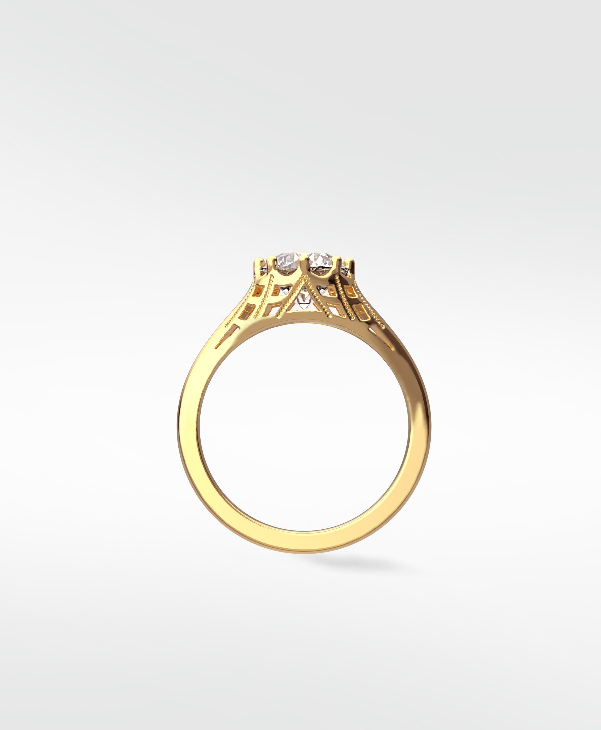 Side profile of the Mondo Engagement Ring in yellow gold, showing its vintage filigree gallery and diamond setting.