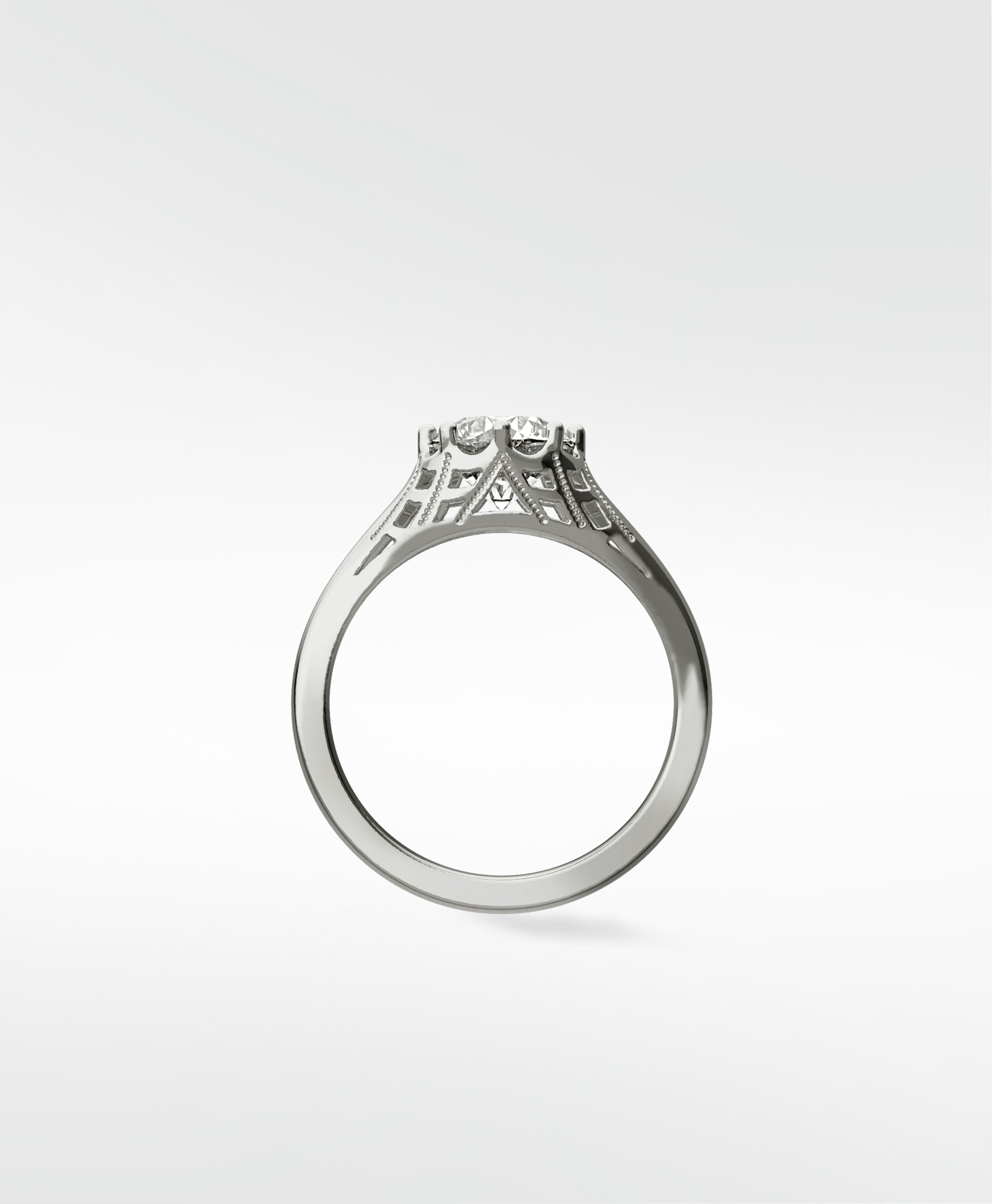 Side profile of the Mondo Engagement Ring in white gold, featuring an intricate vintage filigree setting with two diamonds.