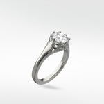 Mondo Engagement Ring in a white gold vintage-style setting with a brilliant round diamond, shown at an angle.