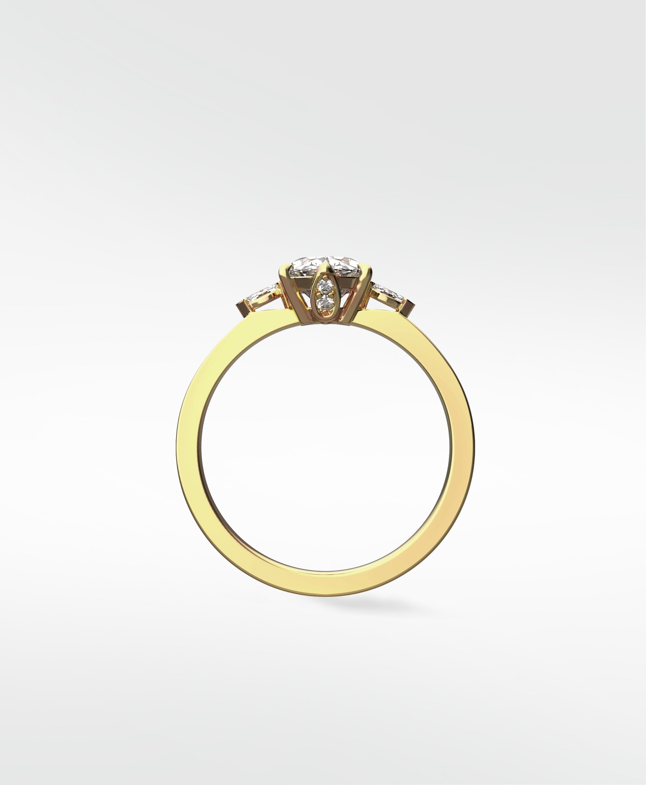 Side profile of the Fern Engagement Ring in yellow gold, featuring an oval diamond with marquise and round accent stones.