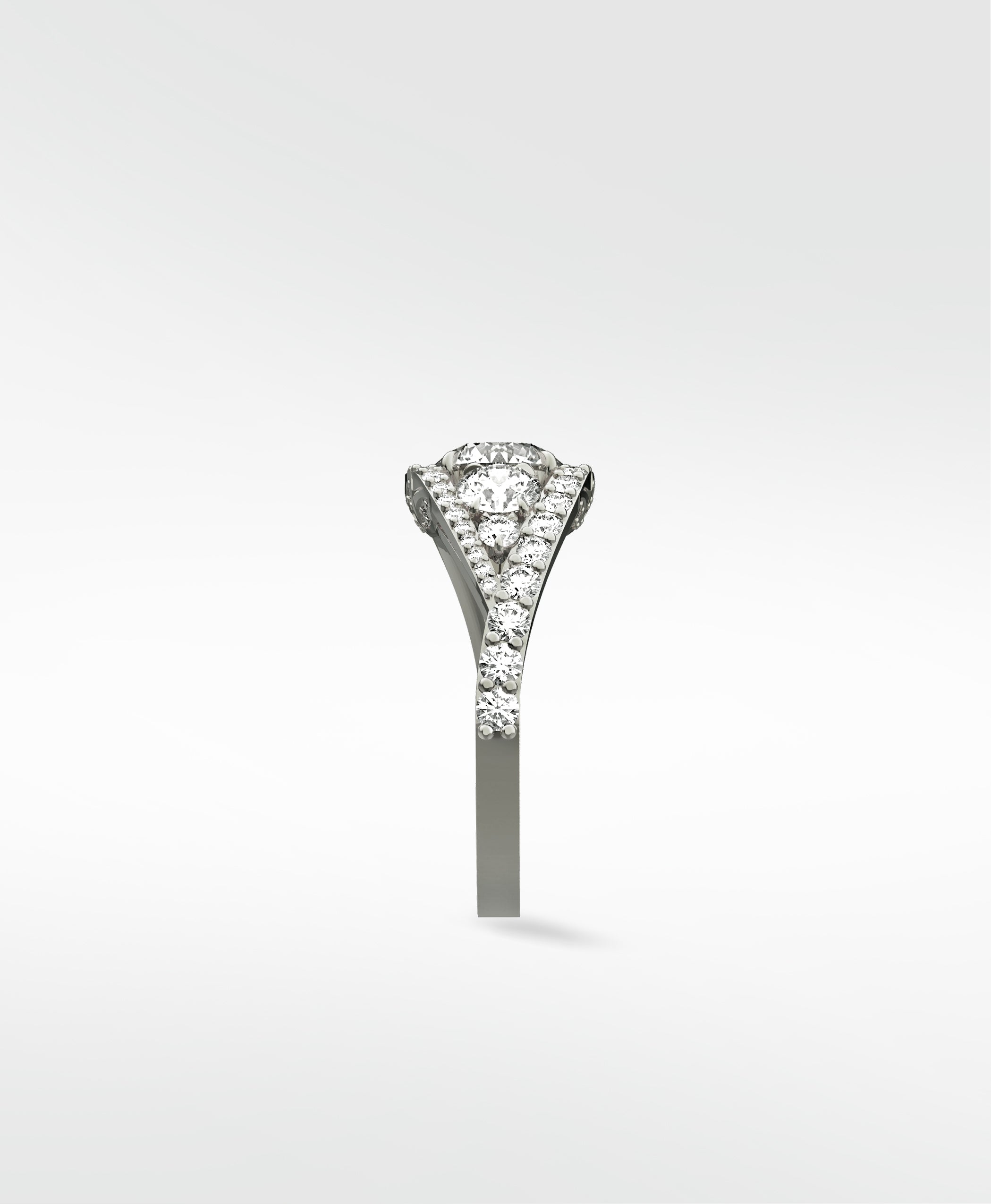 Side profile of the Torreya Diamond Engagement Ring in platinum, showcasing its twisting pavé diamond band.