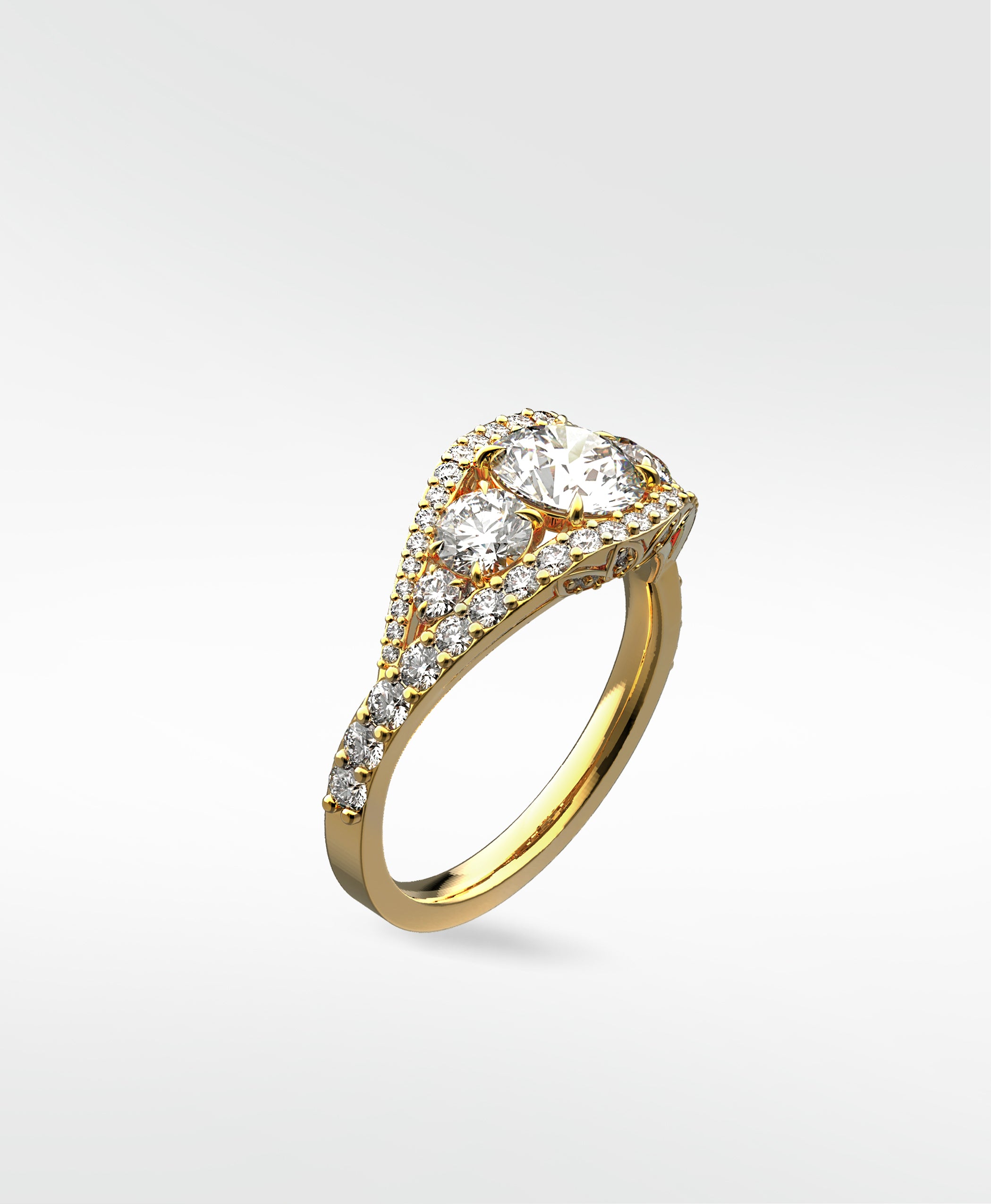 A three-quarter view of the Torreya Diamond Engagement Ring in yellow gold, featuring a unique three-stone halo setting.