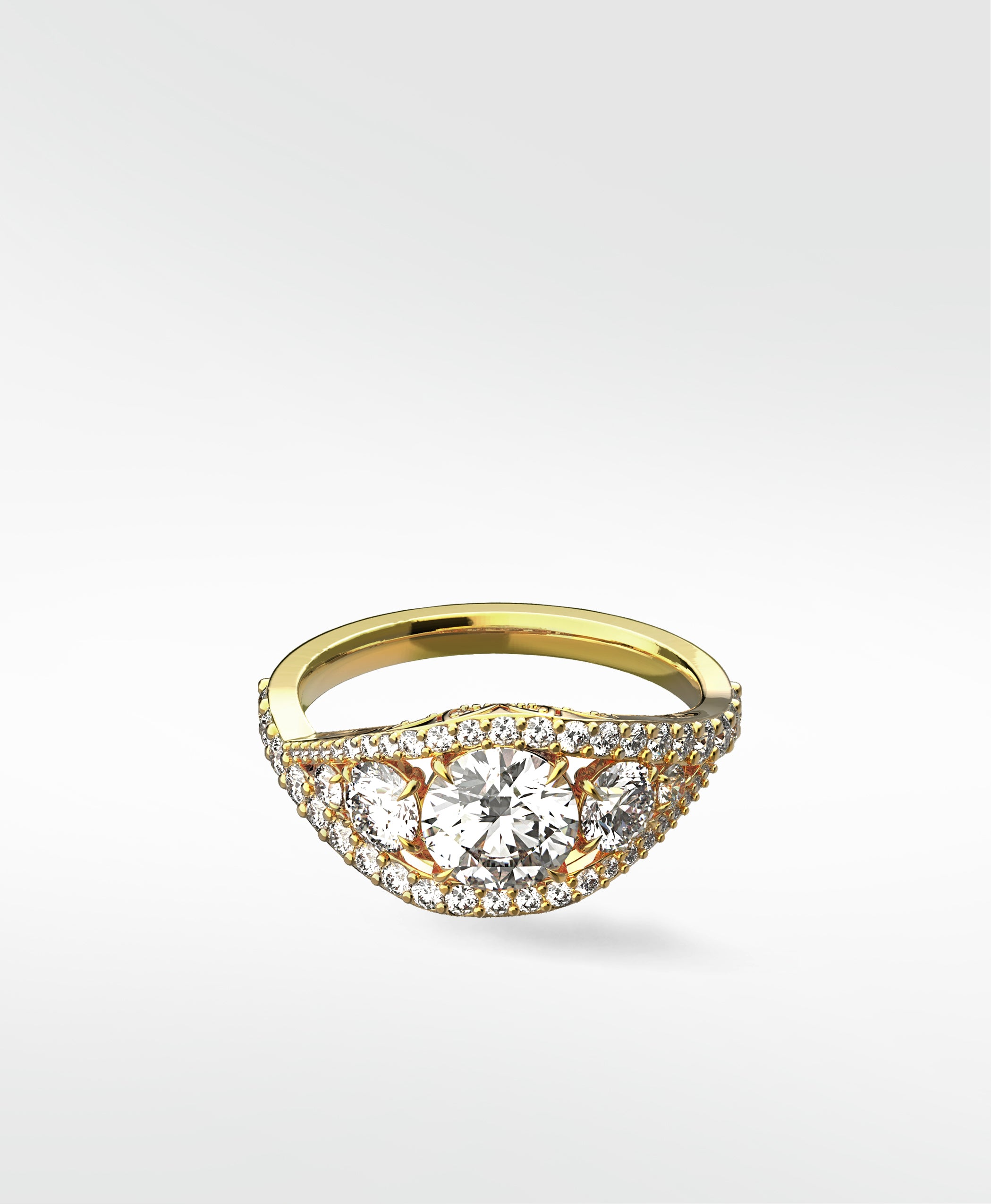 The Torreya Diamond Engagement Ring in yellow gold, featuring a three-stone setting on a curved, pavé diamond band.