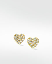 A pair of heart-shaped Forever Love Diamond Studs in yellow gold, covered in brilliant pavé diamonds.