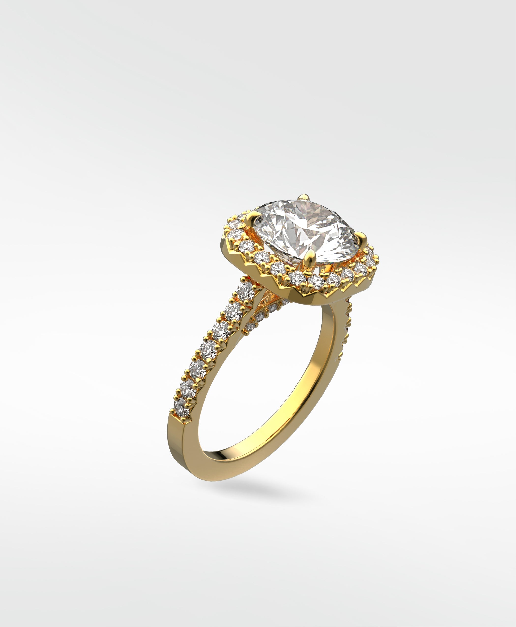 The Sequoia Diamond Engagement Ring in yellow gold, featuring a cushion-cut diamond with a halo and a pavé band.