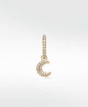 A single yellow gold huggie hoop earring with a dangling crescent moon charm, both pavé-set with brilliant diamonds.